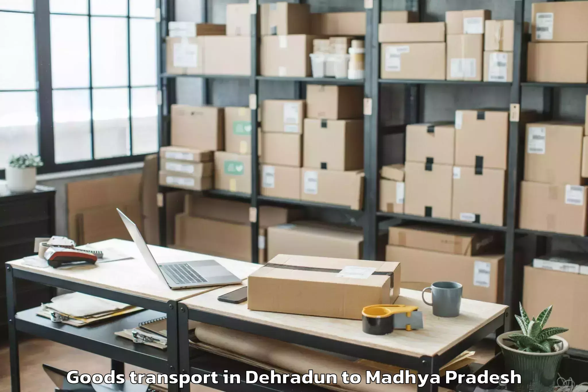 Top Dehradun to Gird Goods Transport Available